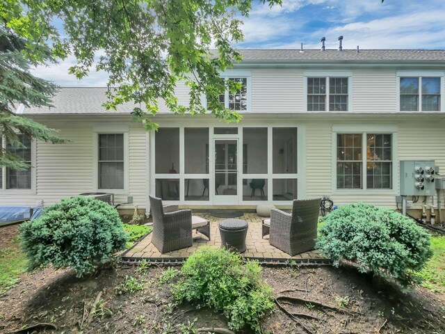 1235 Shagbark Rd, Columbus, OH 43230 - rear view of property with a sunroom