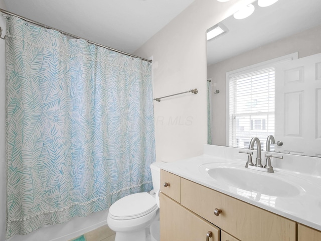 1235 Shagbark Rd, Columbus, OH 43230 - full bathroom featuring vanity, shower / bath combination with curtain, and tile patterned flooring