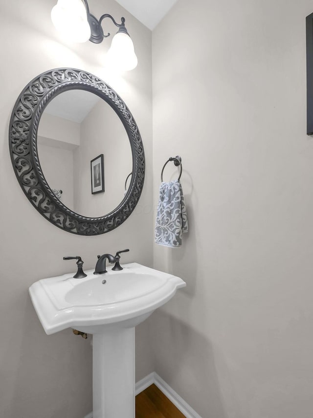 1235 Shagbark Rd, Columbus, OH 43230 - bathroom featuring wood finished floors and baseboards