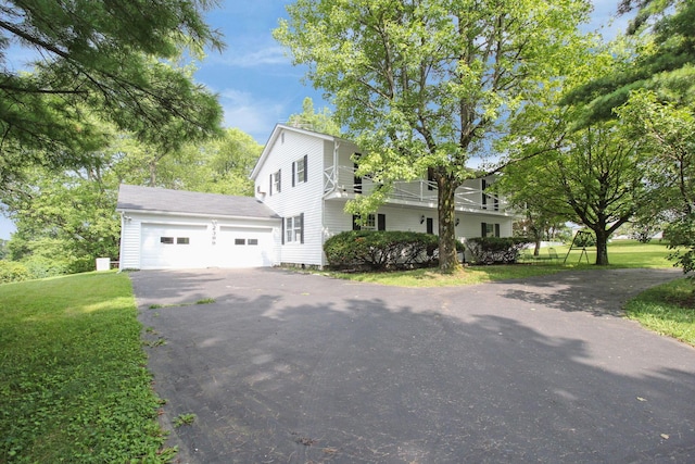2399 Arabelle Dr NE, Lancaster, OH 43130 - view of front of home with driveway, an attached garage, and a front yard