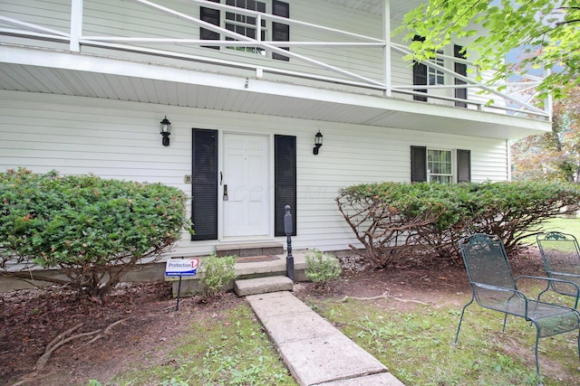 2399 Arabelle Dr NE, Lancaster, OH 43130 - doorway to property with a balcony and covered porch