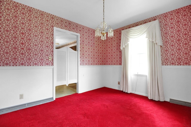 2399 Arabelle Dr NE, Lancaster, OH 43130 - unfurnished room with wallpapered walls, a wainscoted wall, a chandelier, and carpet
