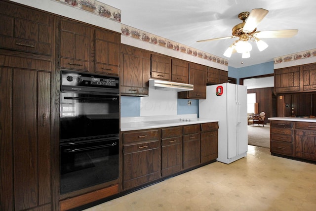 2399 Arabelle Dr NE, Lancaster, OH 43130 - kitchen featuring black appliances, light flooring, light countertops, under cabinet range hood, and a ceiling fan