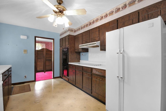 2399 Arabelle Dr NE, Lancaster, OH 43130 - kitchen featuring freestanding refrigerator, light flooring, under cabinet range hood, a ceiling fan, and electric cooktop