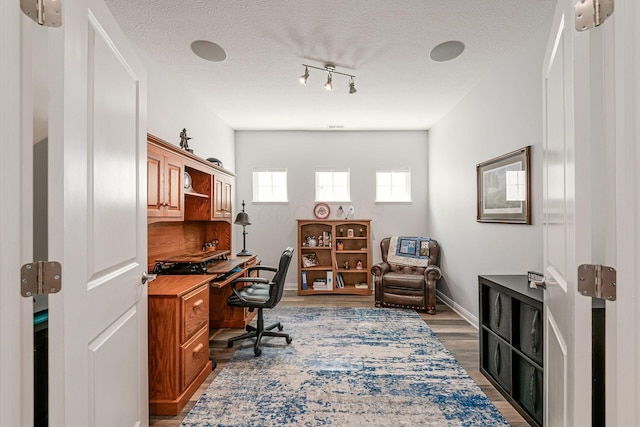 5540 Eva Loop S, Dublin, OH 43016 - office area featuring wood finished floors and a textured ceiling
