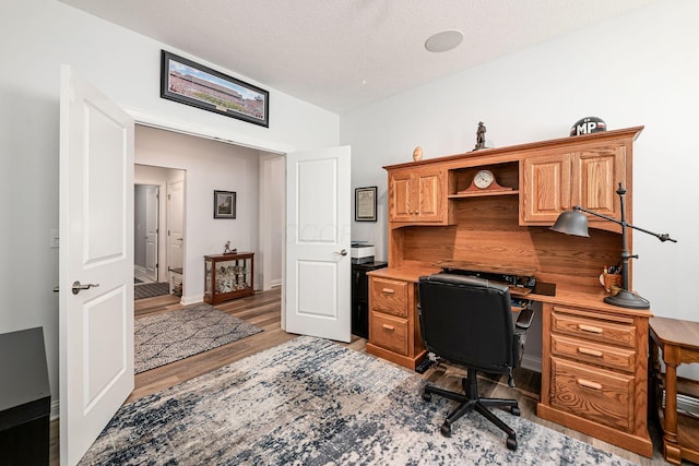 5540 Eva Loop S, Dublin, OH 43016 - office with light wood-style floors and a textured ceiling