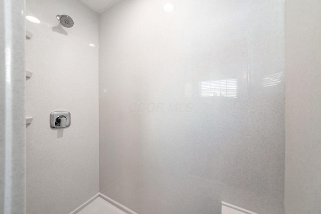 5540 Eva Loop S, Dublin, OH 43016 - bathroom featuring a shower and baseboards