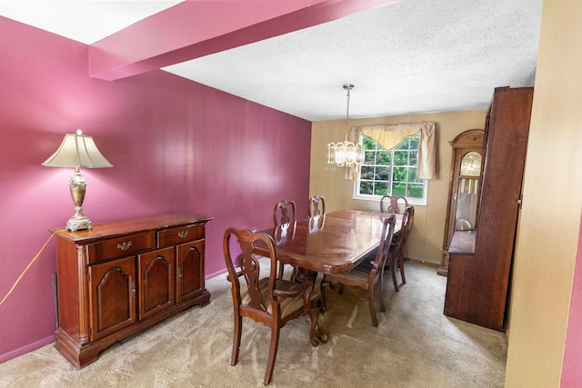 5500 Saddlebrook Dr, Columbus, OH 43221 - dining space featuring light carpet, a chandelier, and a textured ceiling
