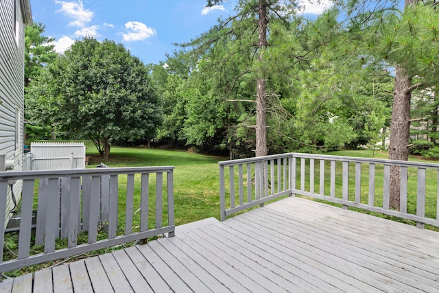 5500 Saddlebrook Dr, Columbus, OH 43221 - wooden deck featuring a lawn and view of scattered trees