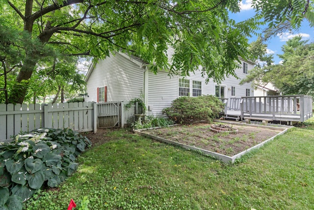5500 Saddlebrook Dr, Columbus, OH 43221 - view of yard featuring a deck and a vegetable garden