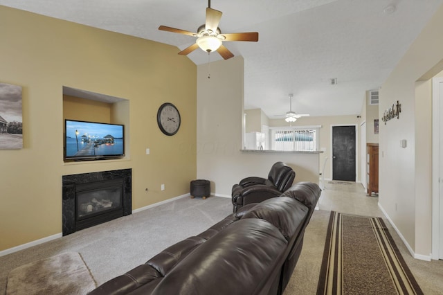 3991 Shannon Green Dr Unit 152, Canal Winchester, OH 43110 - living room with ceiling fan, carpet floors, a fireplace, and vaulted ceiling