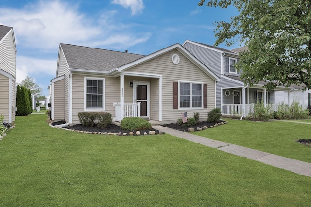3991 Shannon Green Dr Unit 152, Canal Winchester, OH 43110 - view of front of house with a porch, a front yard, and roof with shingles