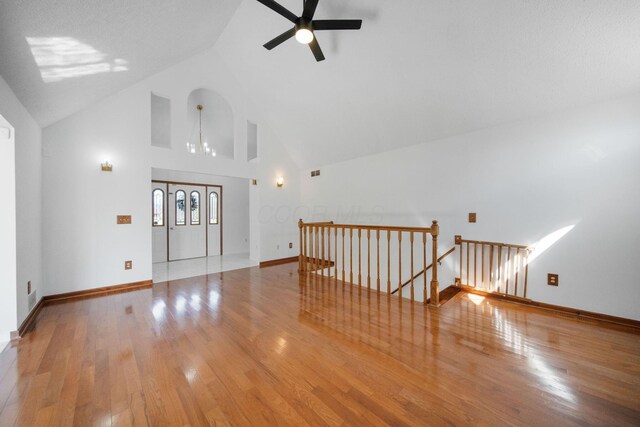 5583 Durrett Rd, Orient, OH 43146 - spare room with ceiling fan, wood finished floors, and high vaulted ceiling