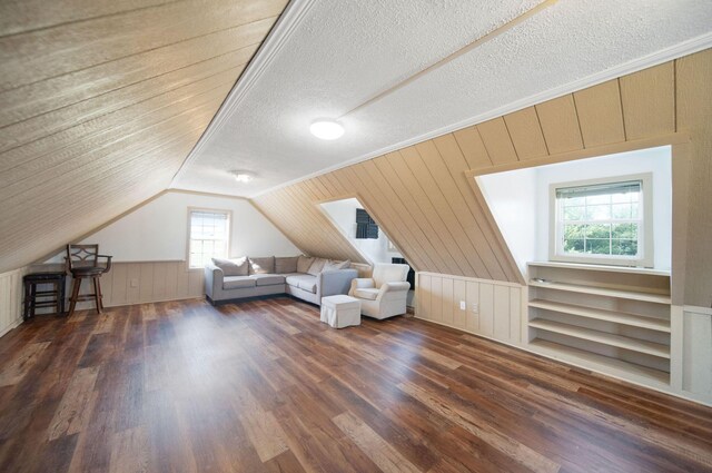 5583 Durrett Rd, Orient, OH 43146 - bonus room featuring wood finished floors, plenty of natural light, vaulted ceiling, and wood walls