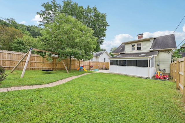 105 Marks Ave, Lancaster, OH 43130 - fenced backyard featuring a sunroom