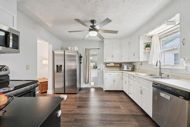 105 Marks Ave, Lancaster, OH 43130 - kitchen featuring stainless steel appliances, a textured ceiling, a ceiling fan, white cabinetry, and dark wood finished floors