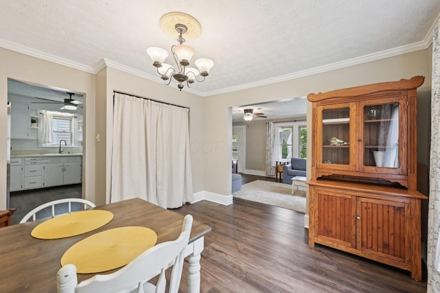 105 Marks Ave, Lancaster, OH 43130 - dining space with a ceiling fan, a textured ceiling, a chandelier, dark wood-style flooring, and crown molding