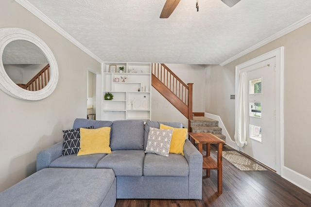 105 Marks Ave, Lancaster, OH 43130 - living area with dark wood-type flooring, stairs, a ceiling fan, crown molding, and a textured ceiling
