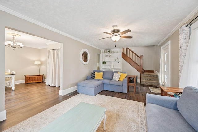 105 Marks Ave, Lancaster, OH 43130 - living area with ceiling fan, wood finished floors, stairs, a textured ceiling, and a chandelier