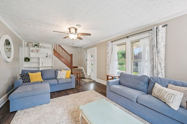 105 Marks Ave, Lancaster, OH 43130 - living room with stairway, dark wood-style flooring, a textured ceiling, crown molding, and a ceiling fan
