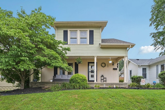 105 Marks Ave, Lancaster, OH 43130 - view of front of property with covered porch, a front yard, and a shingled roof
