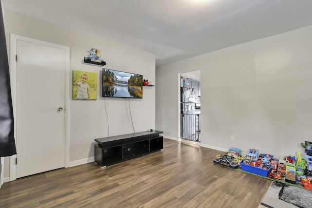 1535 S Hamilton Rd, Columbus, OH 43227 - rec room with wood finished floors and baseboards
