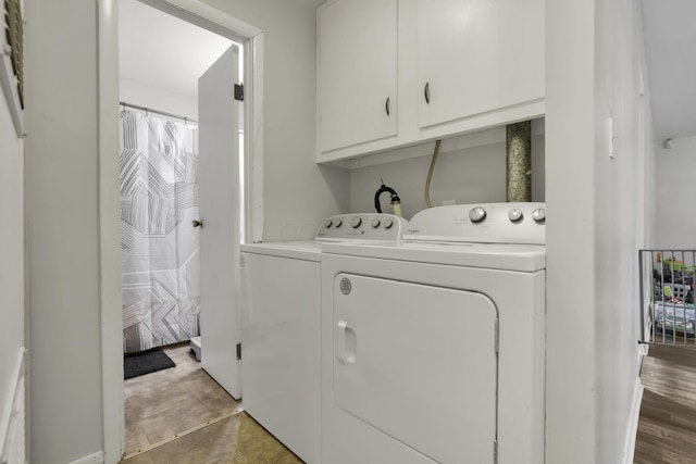 1535 S Hamilton Rd, Columbus, OH 43227 - laundry room featuring separate washer and dryer and cabinet space