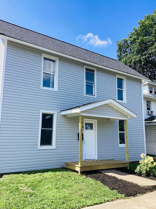 652 E 6th Ave, Lancaster, OH 43130 - view of front facade with a front yard