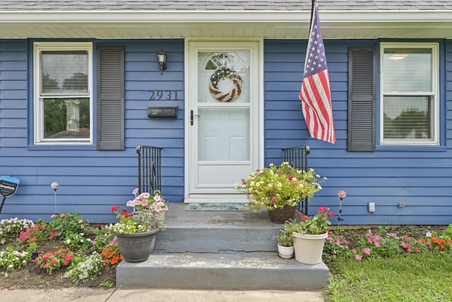 2931 Templeton Rd, Columbus, OH 43209 - property entrance with a shingled roof and a porch