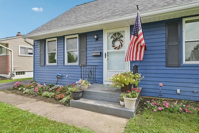 2931 Templeton Rd, Columbus, OH 43209 - view of exterior entry with roof with shingles