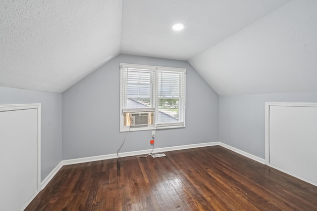 2931 Templeton Rd, Columbus, OH 43209 - additional living space featuring cooling unit, wood finished floors, and vaulted ceiling