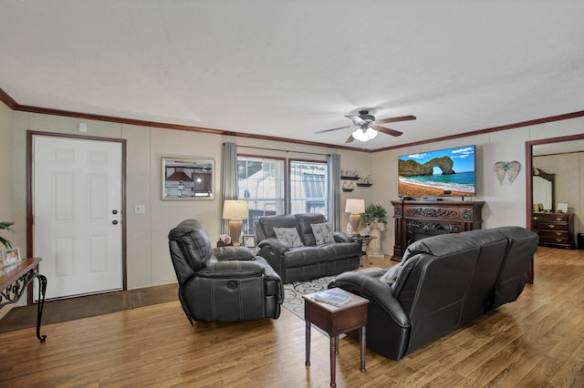 2445 Columbus-Lancaster Rd NW Unit 248Hickory, Lancaster, OH 43130 - living room featuring wood finished floors, ornamental molding, ceiling fan, and a fireplace
