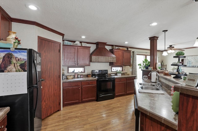 2445 Columbus-Lancaster Rd NW Unit 248Hickory, Lancaster, OH 43130 - kitchen featuring black appliances, premium range hood, ornamental molding, light wood finished floors, and ceiling fan