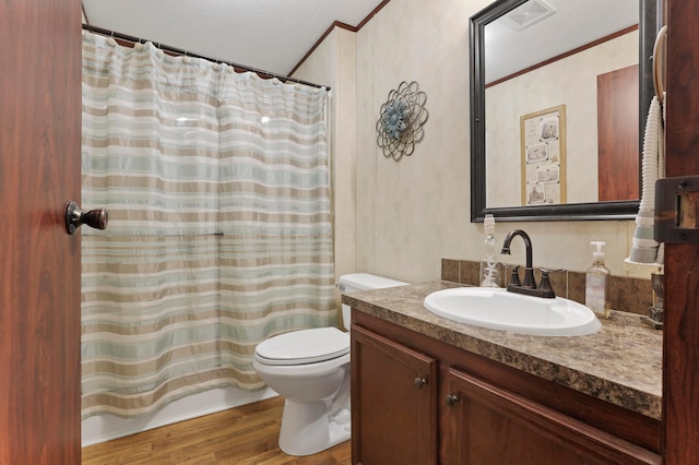 2445 Columbus-Lancaster Rd NW Unit 248Hickory, Lancaster, OH 43130 - full bathroom featuring vanity, wood finished floors, ornamental molding, and a shower with curtain