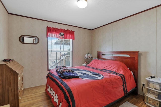 2445 Columbus-Lancaster Rd NW Unit 248Hickory, Lancaster, OH 43130 - bedroom featuring wood finished floors and crown molding