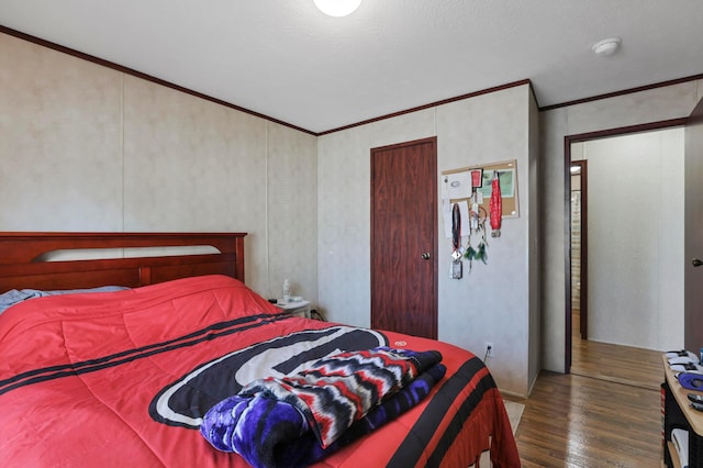 2445 Columbus-Lancaster Rd NW Unit 248Hickory, Lancaster, OH 43130 - bedroom with wood finished floors and ornamental molding
