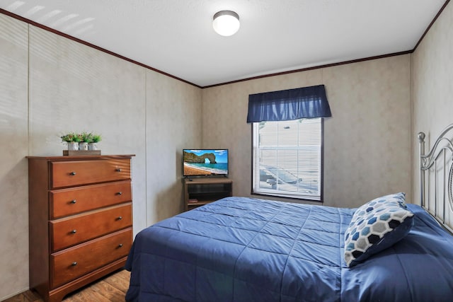 2445 Columbus-Lancaster Rd NW Unit 248Hickory, Lancaster, OH 43130 - bedroom featuring wood finished floors and crown molding