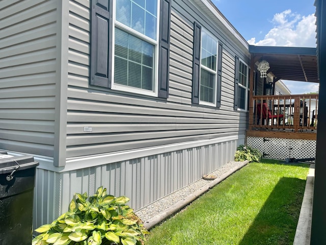 2445 Columbus-Lancaster Rd NW Unit 248Hickory, Lancaster, OH 43130 - view of side of home featuring a wooden deck and a lawn