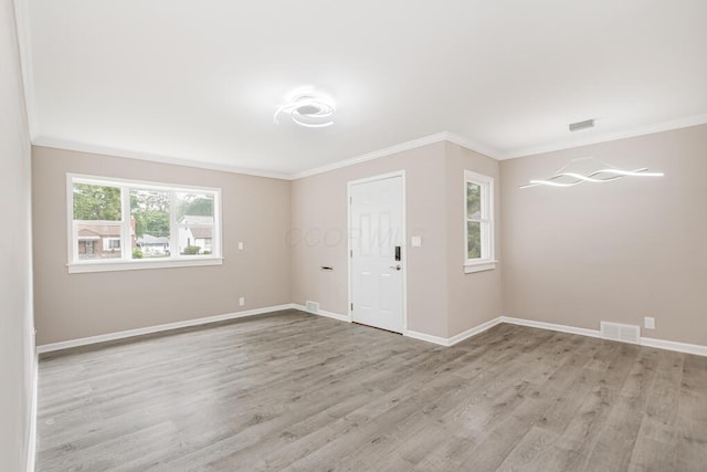 205 N Gould Rd, Columbus, OH 43209 - entrance foyer featuring crown molding and light wood finished floors