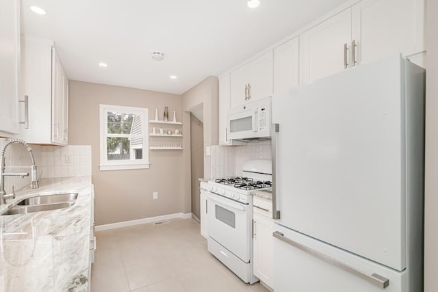 205 N Gould Rd, Columbus, OH 43209 - kitchen featuring white appliances, decorative backsplash, white cabinetry, and recessed lighting