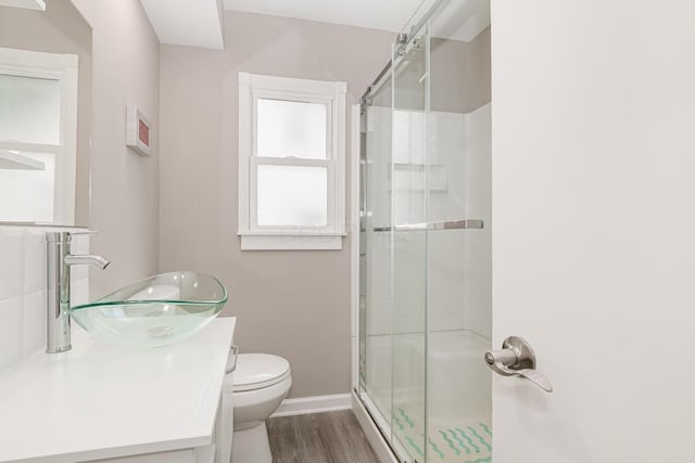 205 N Gould Rd, Columbus, OH 43209 - full bathroom featuring a stall shower, vanity, and wood finished floors