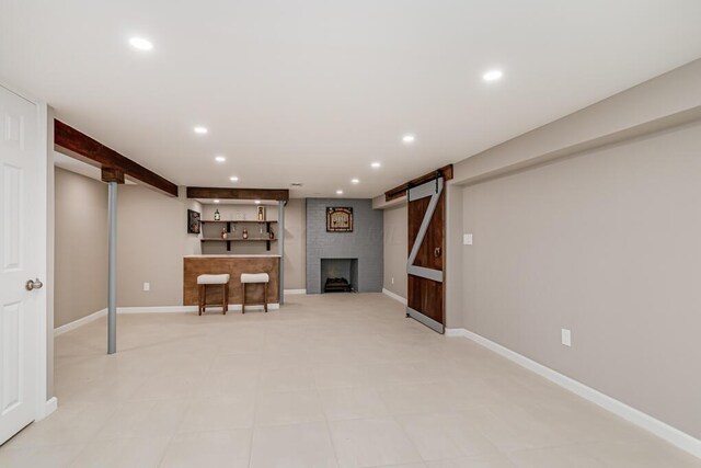 205 N Gould Rd, Columbus, OH 43209 - finished basement with recessed lighting and a fireplace