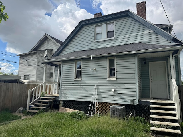 1345 E Livingston Ave Unit 1347, Columbus, OH 43205 - rear view of property featuring a chimney