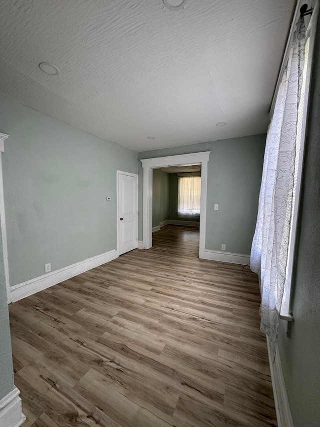 1345 E Livingston Ave Unit 1347, Columbus, OH 43205 - spare room with wood finished floors and baseboards