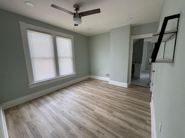 1345 E Livingston Ave Unit 1347, Columbus, OH 43205 - empty room featuring ceiling fan and light wood-style floors