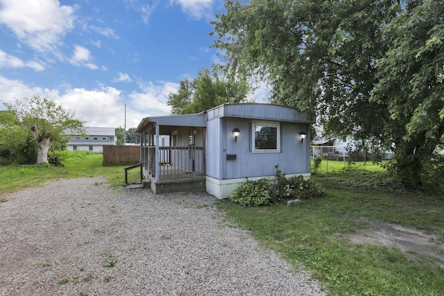 19 E 1st St, The Plains, OH 45780 - manufactured / mobile home featuring driveway