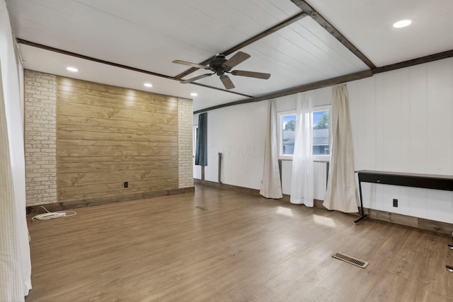 19 E 1st St, The Plains, OH 45780 - unfurnished room featuring ceiling fan, wooden walls, wood finished floors, and recessed lighting