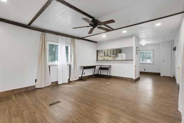 19 E 1st St, The Plains, OH 45780 - unfurnished living room featuring a ceiling fan, wood finished floors, and recessed lighting