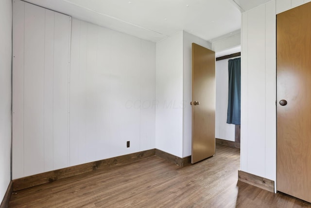 19 E 1st St, The Plains, OH 45780 - unfurnished room with wood finished floors and baseboards