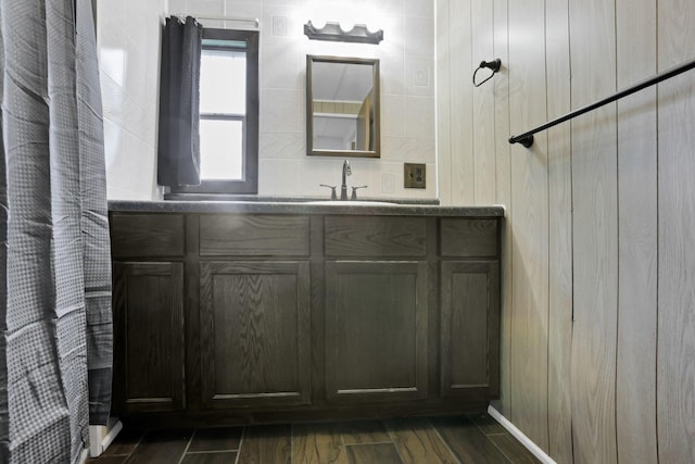 19 E 1st St, The Plains, OH 45780 - full bathroom featuring vanity, a shower with shower curtain, and wood finished floors